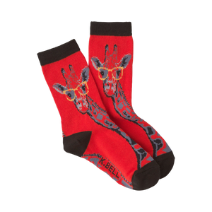 Pair of red crew socks with a pattern of giraffes wearing glasses. The giraffes are gray and the glasses are yellow.
