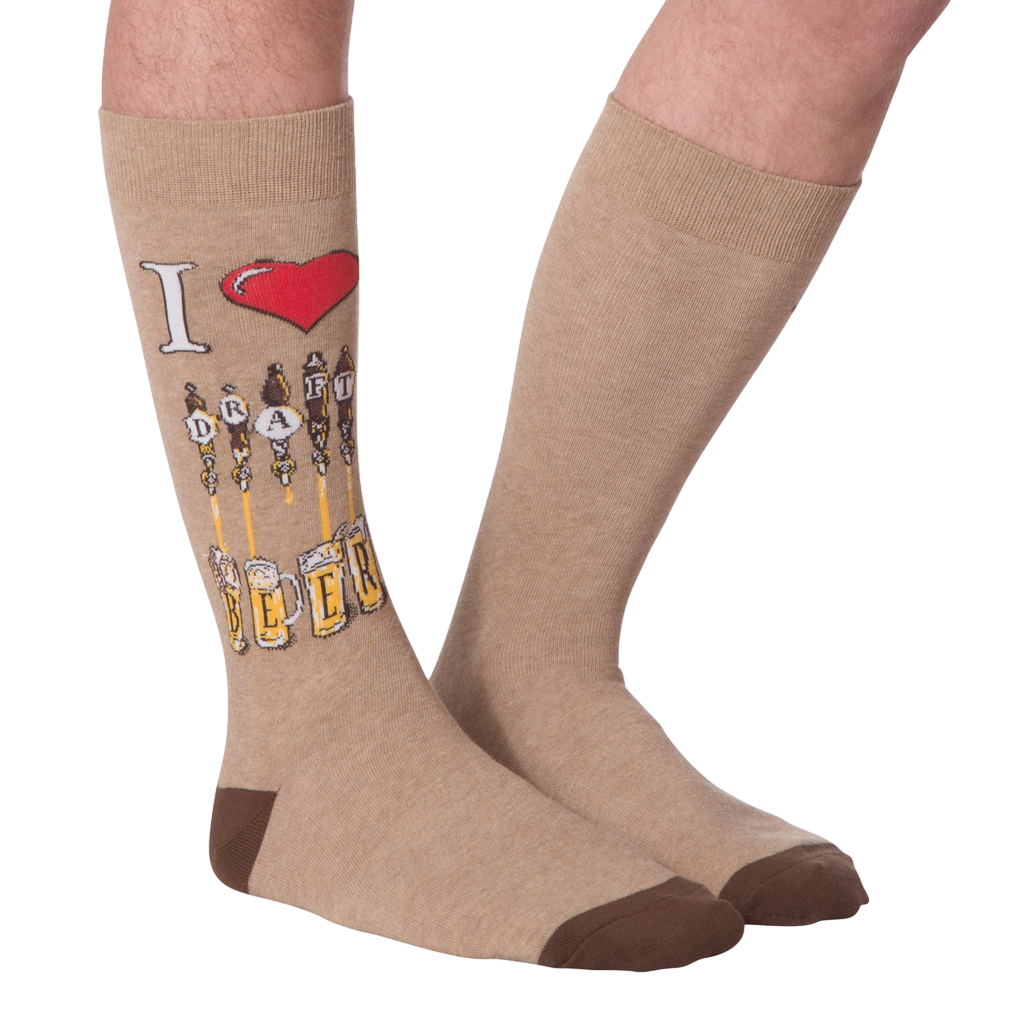 Flat lay of a pair of tan 'Draft Beer' socks showing the full design, including the 'I heart Draft Beer' graphic and beer tap image.