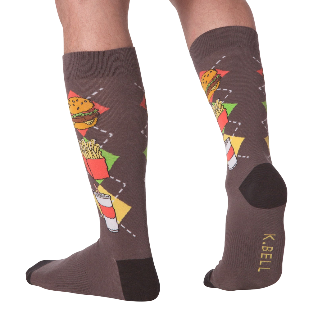 Back view of a person wearing the Junk Food socks, showcasing the full design on the leg.