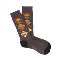 A pair of dark gray crew socks with a colorful argyle pattern of burgers, fries, and soda cups. The socks have black toes and heels.