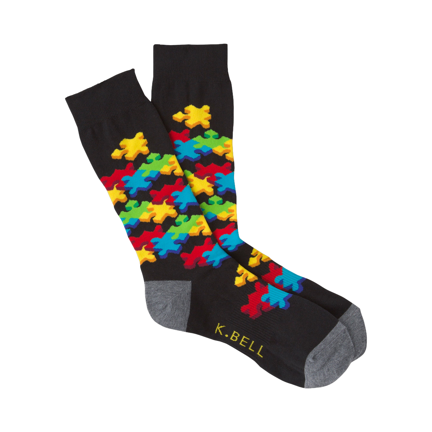 Black crew socks with a colorful 3D puzzle piece design.  Features red, yellow, blue, and green puzzle pieces.