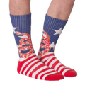 Front view of 'Don't Tread' socks on a person's legs.
