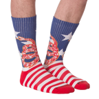 Front view of 'Don't Tread' socks on a person's legs.