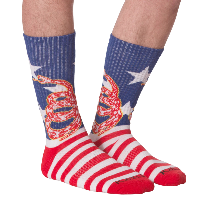 Front view of 'Don't Tread' socks on a person's legs.