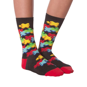 Close-up view of the 3D Jigsaw socks from the front, showcasing the colorful puzzle piece pattern.