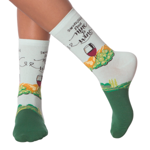 Lifestyle shot showing 'Nine to Wine' socks on a person's legs.