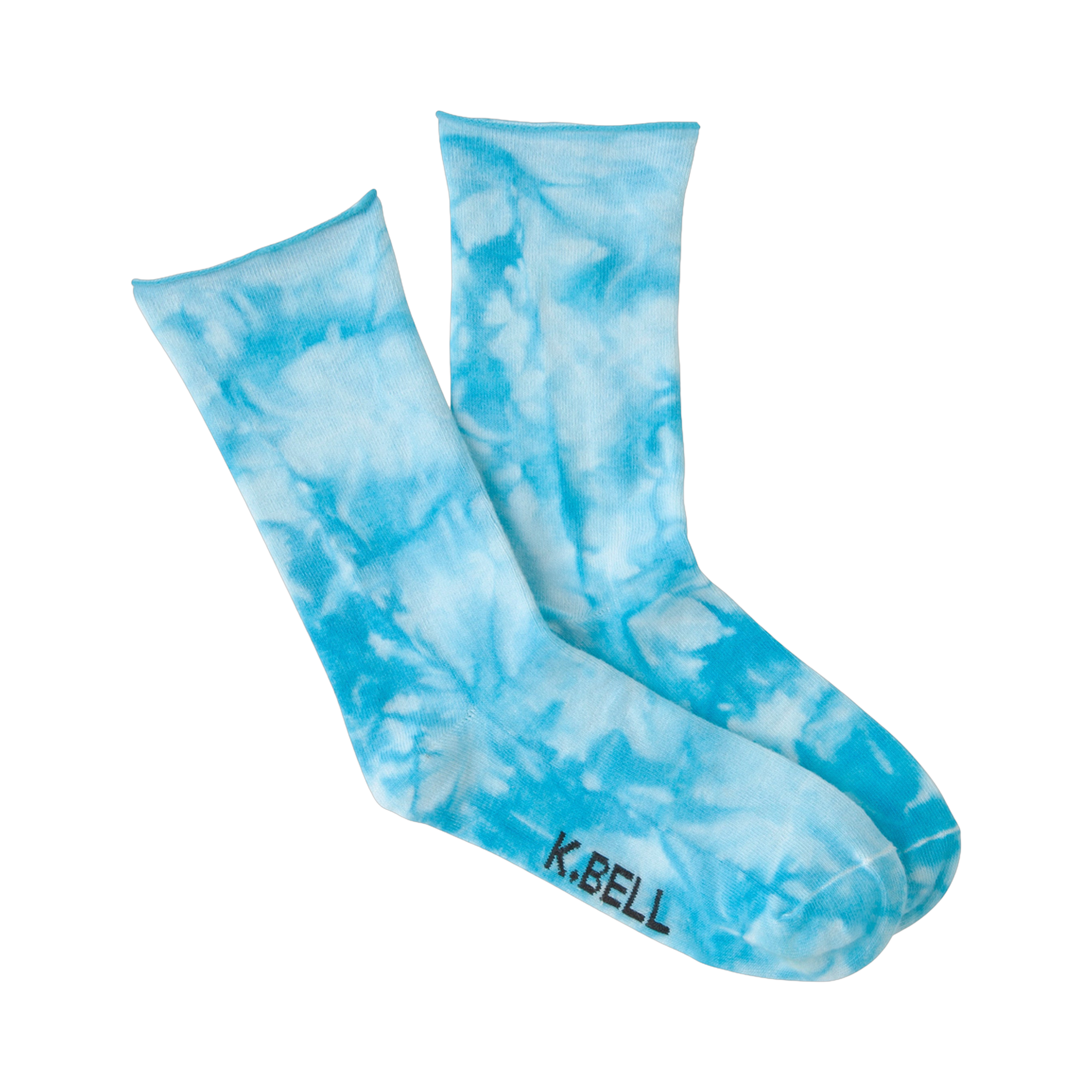 Lifestyle shot showing the light blue tie-dye socks on a model's feet.