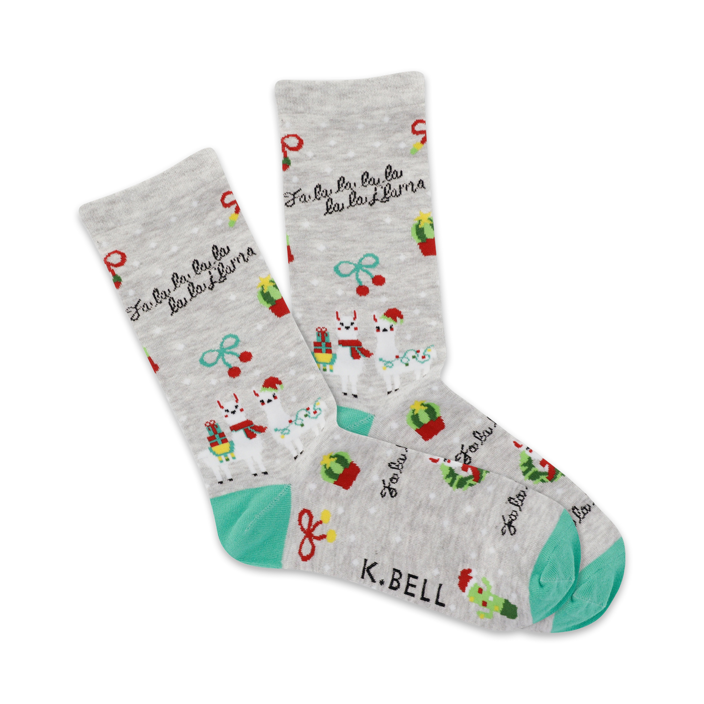 Crew socks in grey with teal accents. Festive llamas carrying gifts, cacti, and 'Fa La La La Llama' text are on a light grey background.