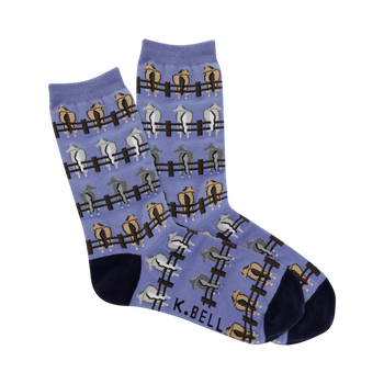 Crew socks in periwinkle blue with a repeating pattern of horses' rear ends peeking over brown fences.  Horses are beige, light gray, and tan.