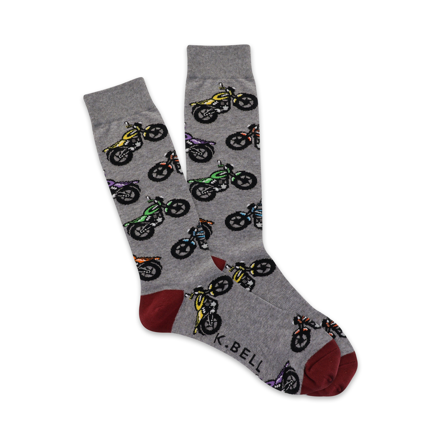 Pair of grey crew socks with a repeating pattern of multicolored motorcycles.  Red and grey heel and toe.