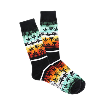 Pair of crew socks, black with horizontal stripes of orange, red, yellow, and teal, featuring a repeating pattern of dark-green marijuana leaf silhouettes.