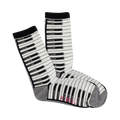 A pair of cream crew socks with a black and white piano key pattern. The cuffs are black, and the bottom is grey.