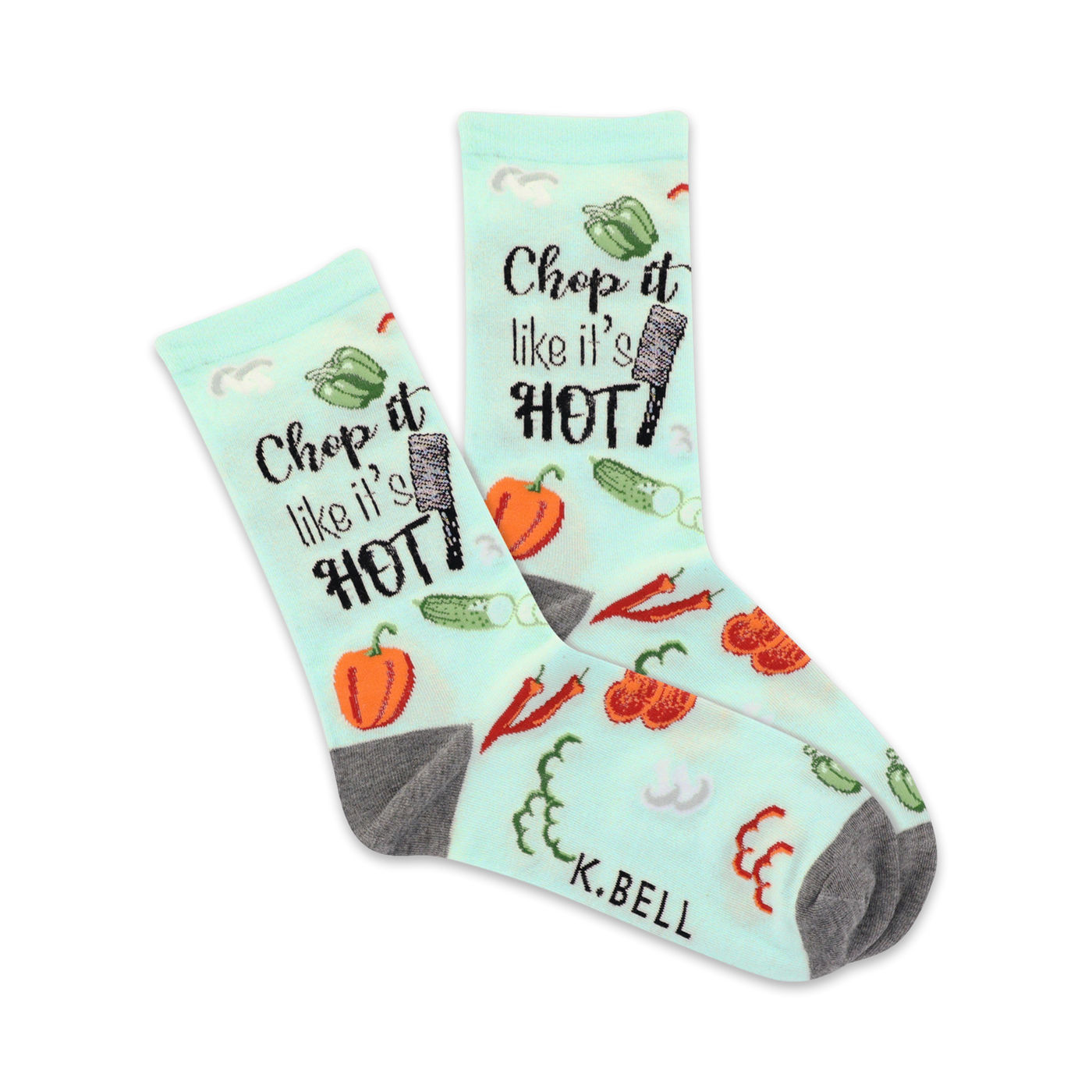 A pair of crew socks on a white background. Light teal socks with a pattern of vegetables and the phrase 'Chop it like it's hot'. Gray heels and toes.