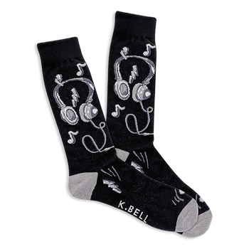 Pair of black crew socks with white and gray headphones, musical notes, and lightning bolt designs. Light gray heel and toe.