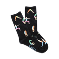 Pair of black crew socks with colorful illustrations of diverse women in various yoga poses.  'K.BELL' is subtly printed on the sole.