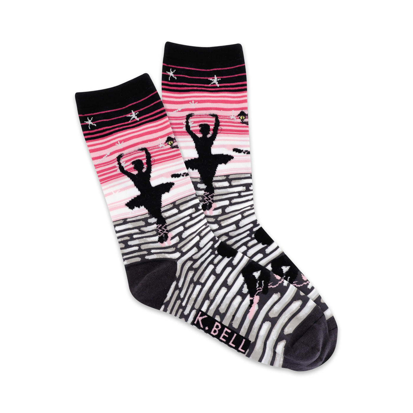 A pair of women's crew socks showcasing a ballerina silhouette against a pink and grey brick pathway. Stars and other small design elements are included.