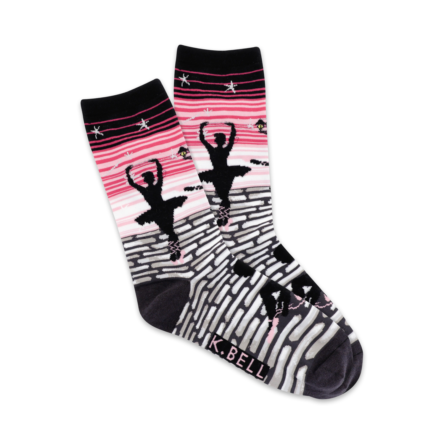 A pair of women's crew socks showcasing a ballerina silhouette against a pink and grey brick pathway. Stars and other small design elements are included.