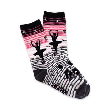 A pair of women's crew socks showcasing a ballerina silhouette against a pink and grey brick pathway. Stars and other small design elements are included.