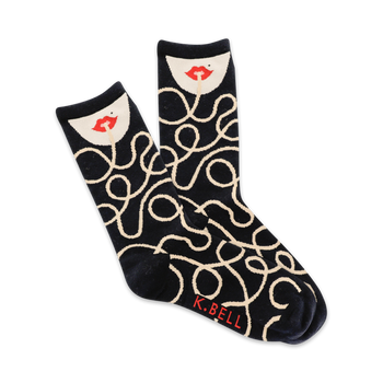 novelty socks with black and white spaghetti design and red k. bell logo. womens crew.  