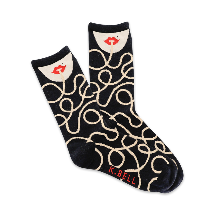 novelty socks with black and white spaghetti design and red k. bell logo. womens crew.   }}