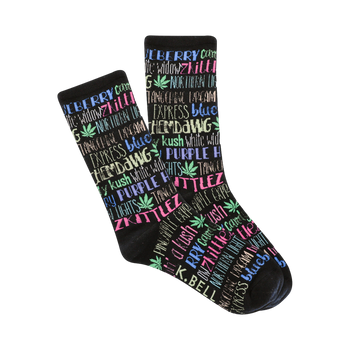 Pair of black crew socks. The socks feature a colorful pattern of cannabis strain names (e.g., 'Zkittles', 'Northern Lights') in pink, blue, and purple, with small marijuana leaf graphics.
