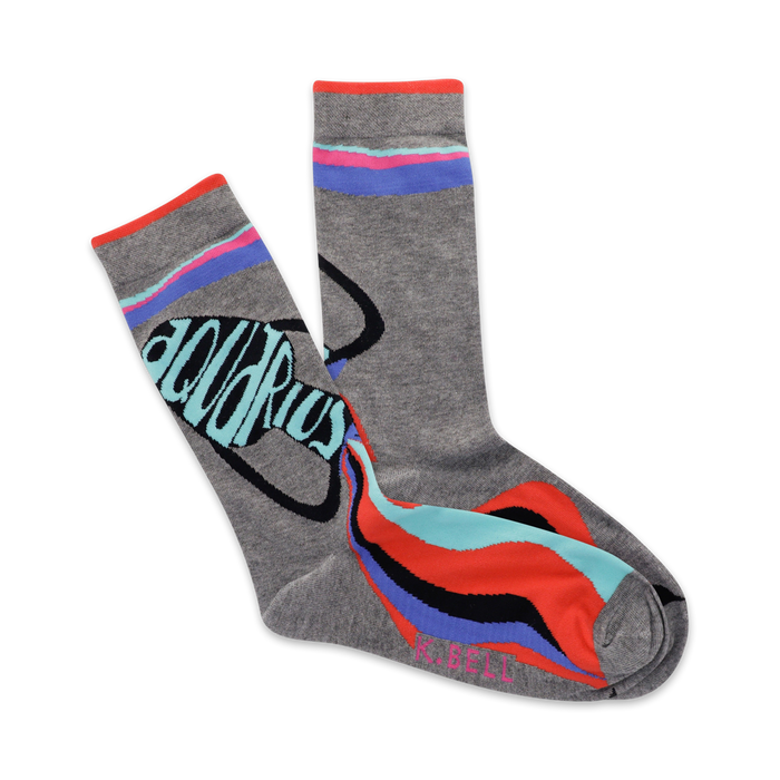 gray crew socks with a wave pattern in black, blue, red, and pink. with the words aquarius pouring out a large jar }}
