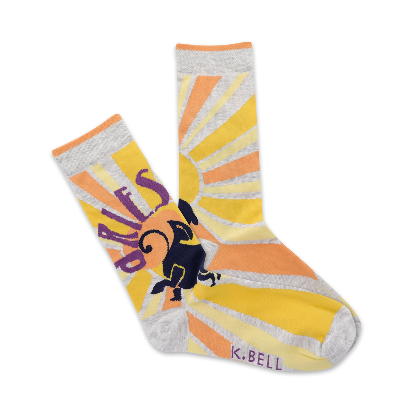 Crew socks in yellow, orange, and grey.  A sunburst design surrounds an illustrated ram, with 'Aries' partially visible.