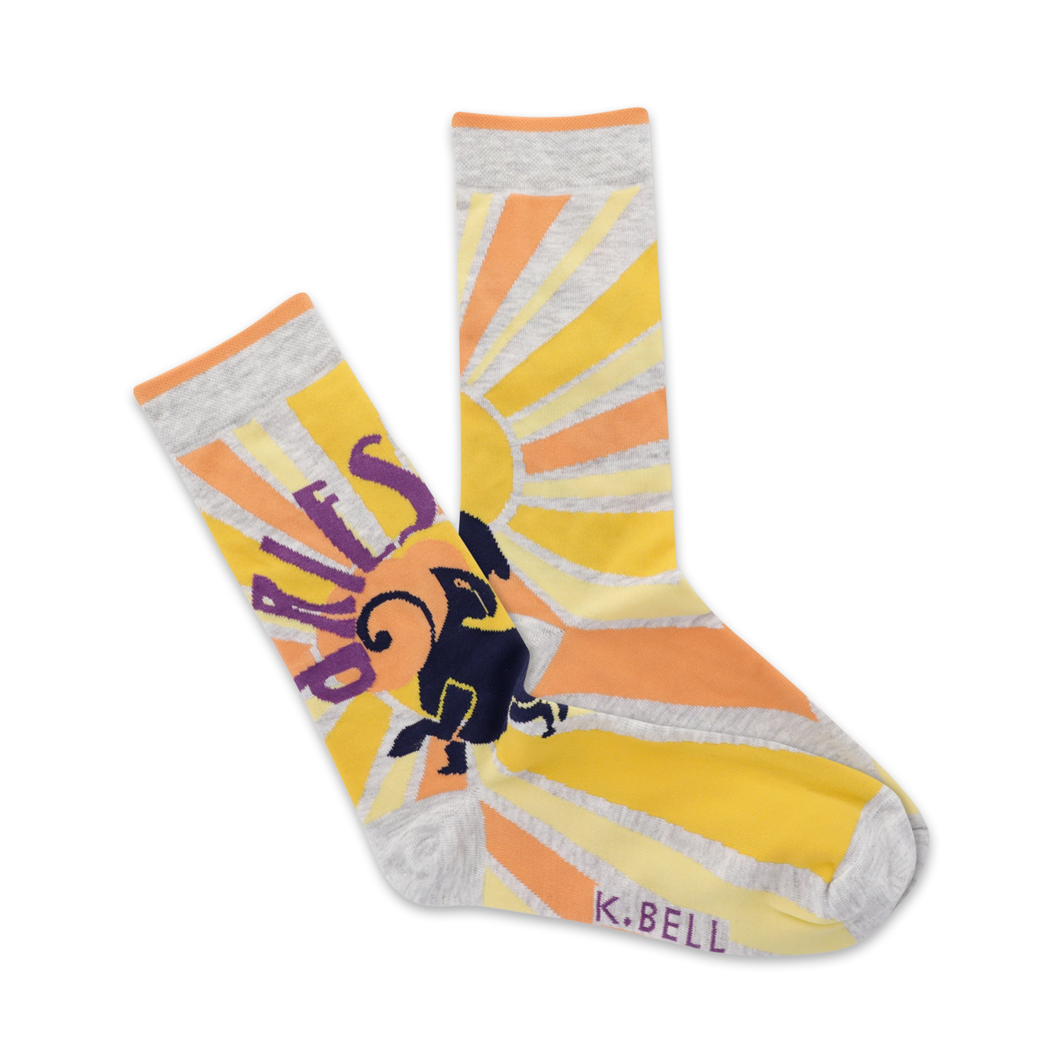 Crew socks in yellow, orange, and grey.  A sunburst design surrounds an illustrated ram, with 'Aries' partially visible.