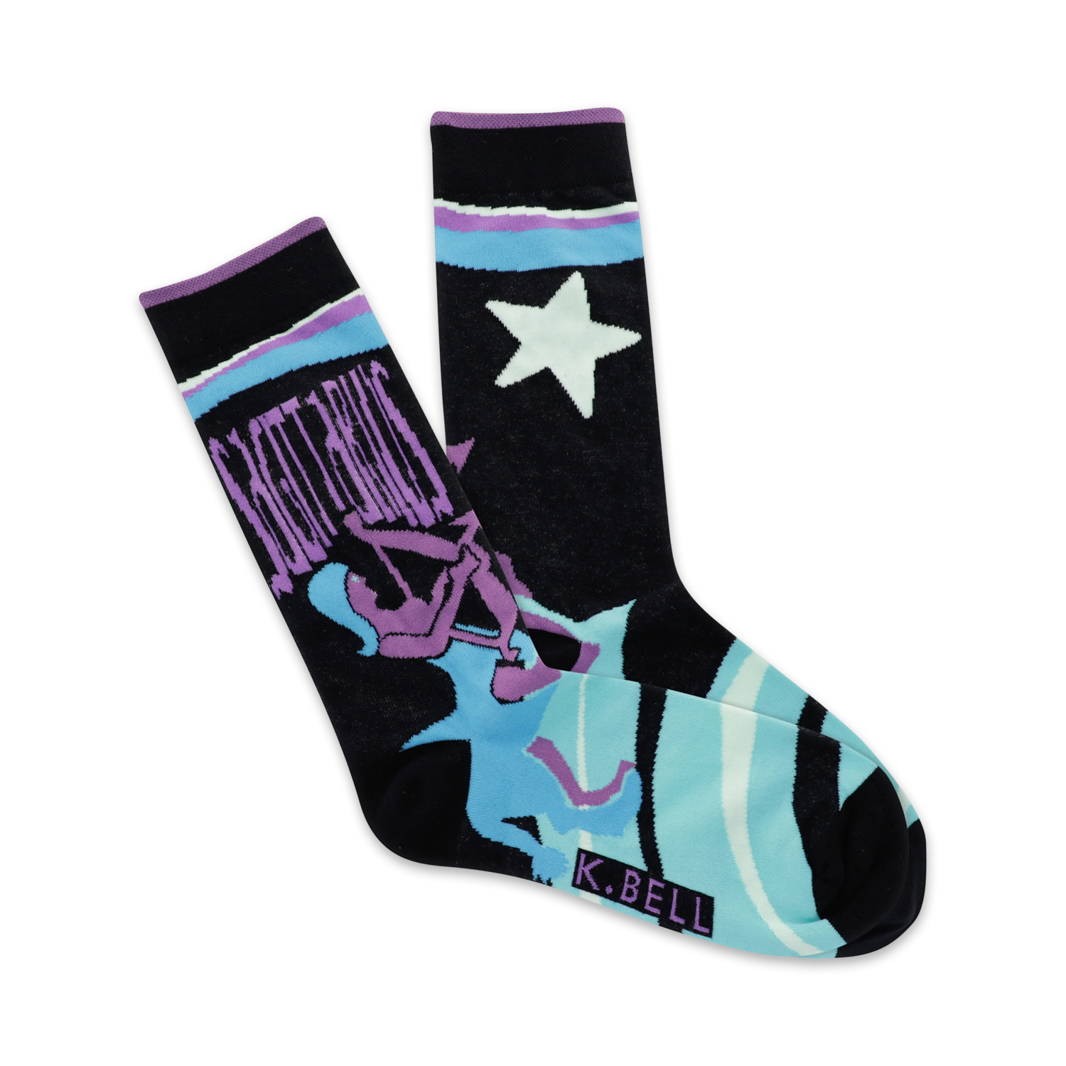 A pair of black crew socks with a teal, purple, and white Sagittarius design and a star. The brand K.BELL is visible on the sole.