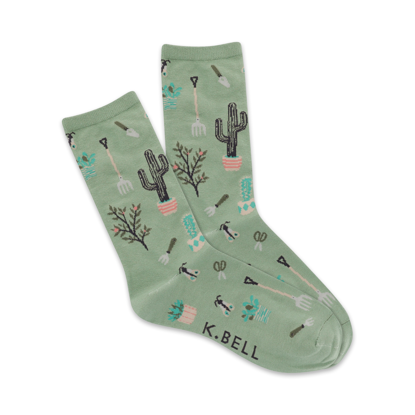 Pair of sage green crew socks featuring cacti, gardening tools, and small plants in a repeating pattern.