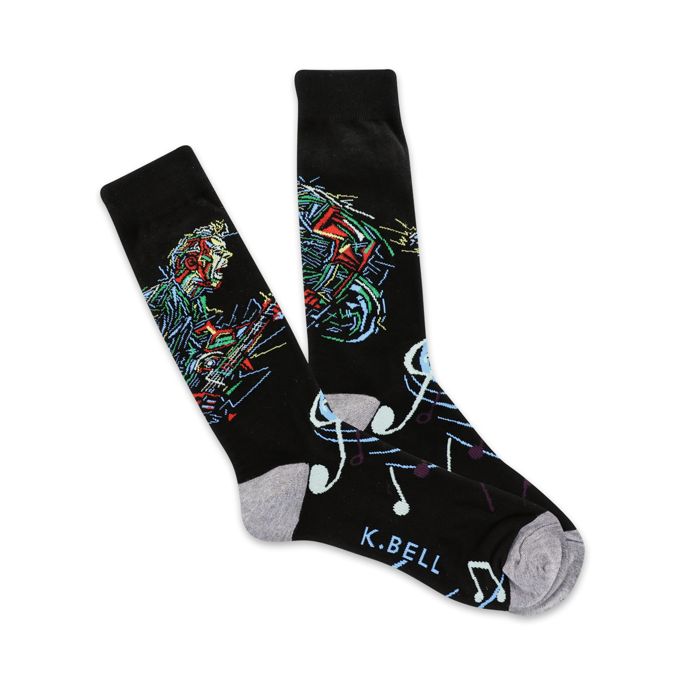 Pair of black crew socks with a colorful illustration of a musician playing guitar and musical notes. 
