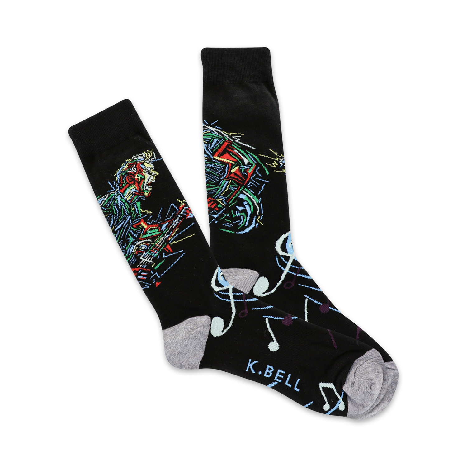 Pair of black crew socks with a colorful illustration of a musician playing guitar and musical notes. 