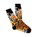 A pair of crew socks with a tiger face design. The tigers are predominantly orange and black with green eyes, set against a black background.