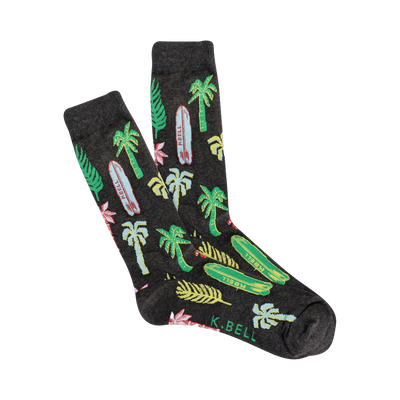 Crew socks in dark gray with a repeating pattern of palm trees, surfboards, and tropical leaves in bright teal, green, pink, and yellow.