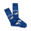 A pair of blue crew socks with grey sharks and the text 'Bite Me' printed on them. 