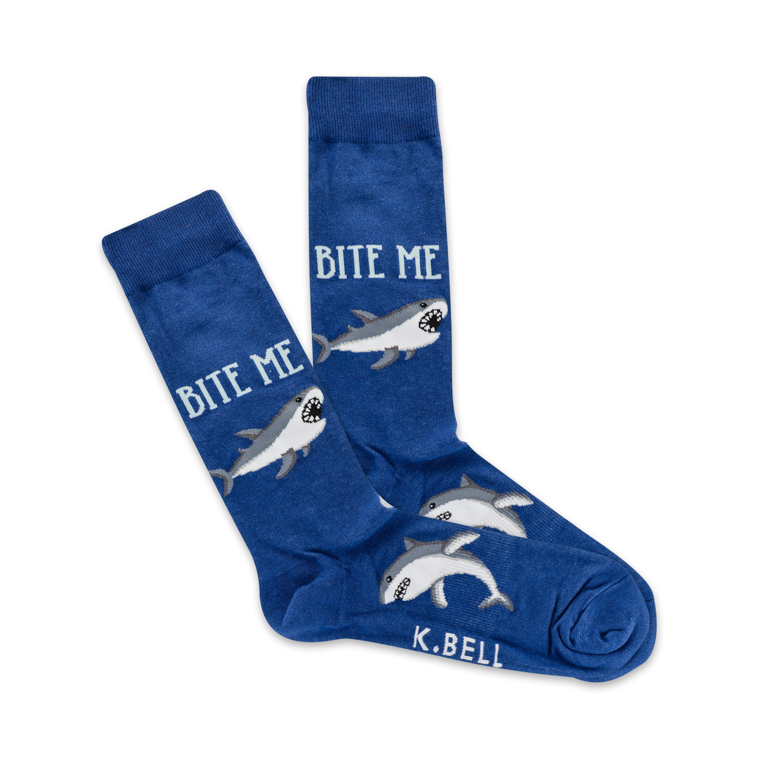 A pair of blue crew socks with grey sharks and the text 'Bite Me' printed on them. 