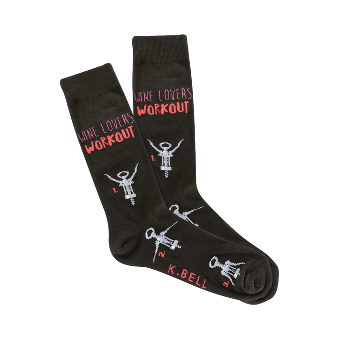 A pair of dark-greenish brown crew socks.  The socks have a 'Wine Lovers Workout' design with illustrated corkscrews and numbers 1-3. }}