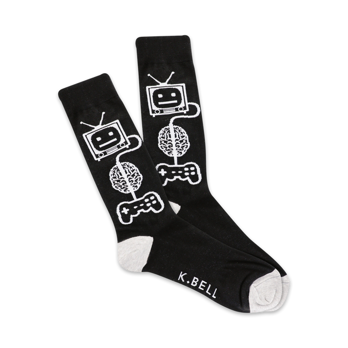 men's crew socks in black with a pattern of white brains with tiny televisions and video game controllers on them.    }}