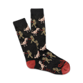 Pair of dark grey crew socks with a repeating pattern of cartoon T-Rexes boxing robots. Red accents on the heel and toe.