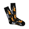 Pair of black crew socks with orange and gray cats clinging playfully. The cats have sharp claws and are set against a dark background.