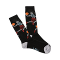 Pair of black crew socks with a zigzag pattern featuring stylized basketball players in red, orange, and light blue. Grey cuffs.