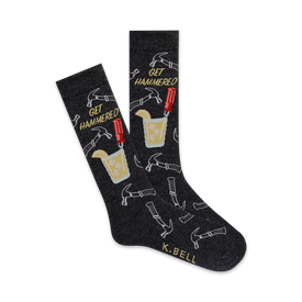 black crew socks with hammers, screwdrivers and a mixed drink with lemon wedge. the words 'get hammered' are knit into the sock  
