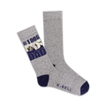 A pair of grey crew socks with navy blue cuffs. The socks display a graphic of a dog paw bumping a fist with the text '#1 DOG DAD'.