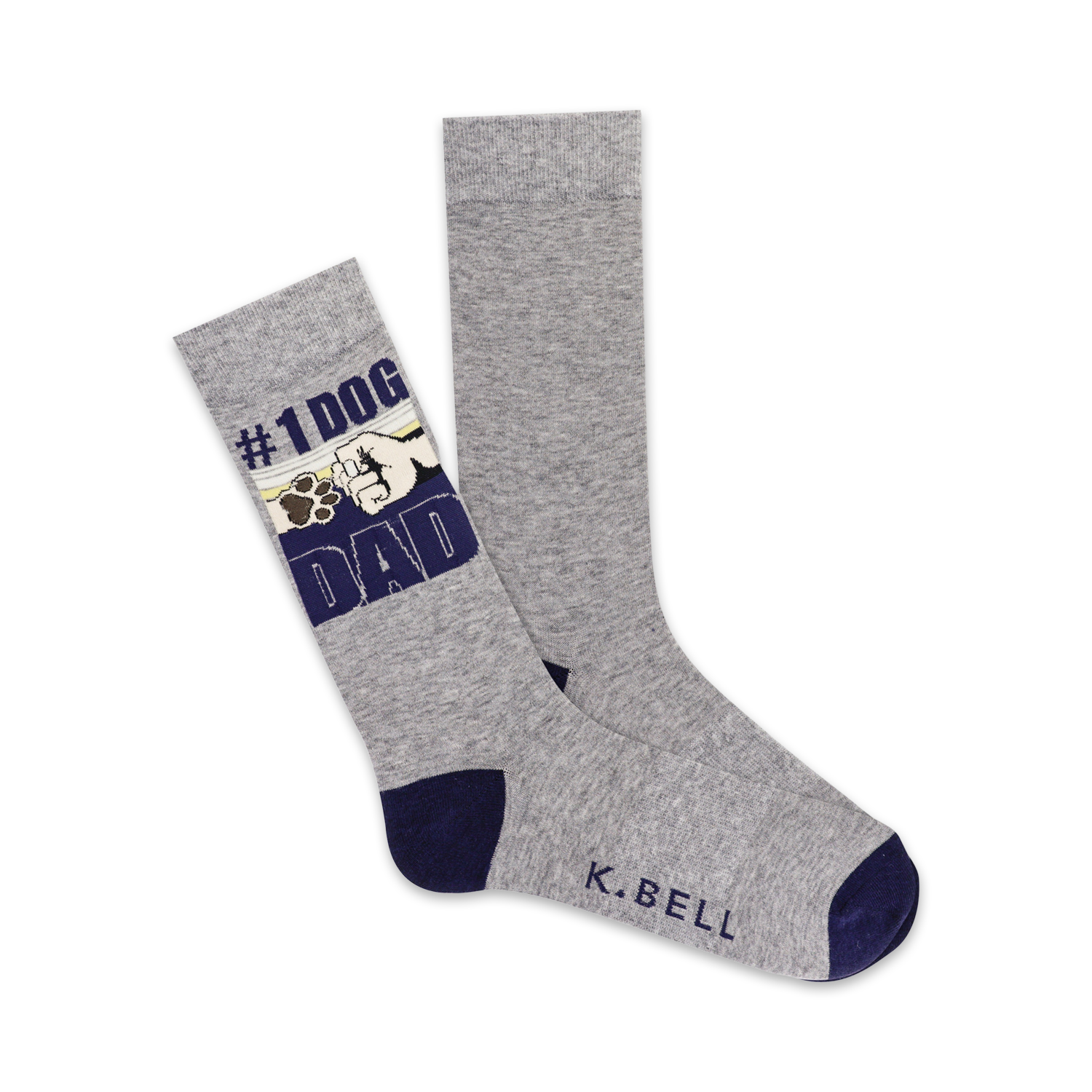 A pair of grey crew socks with navy blue cuffs. The socks display a graphic of a dog paw bumping a fist with the text '#1 DOG DAD'.