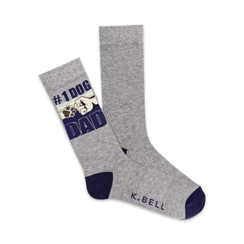 crew-length gray socks with '{#1 dog dad}' on the left sock and a paw print on the right sock.  