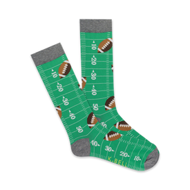 mens football field crew socks in green with football and yard marker pattern.  