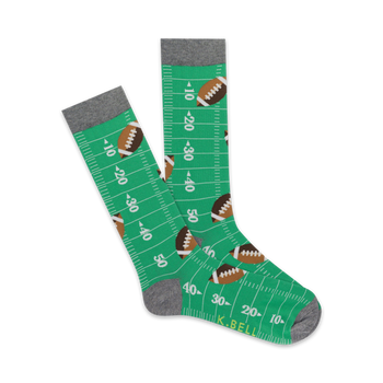 mens football field crew socks in green with football and yard marker pattern.  