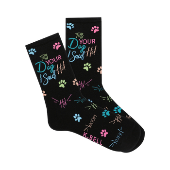 Pair of black crew socks featuring a playful design of pastel-colored paw prints and the phrase 'Tell Your Dog I Said Hi!'