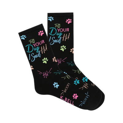 Pair of black crew socks featuring a playful design of pastel-colored paw prints and the phrase 'Tell Your Dog I Said Hi!'