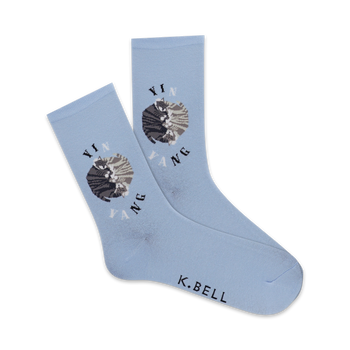 blue women's crew socks with a black and white cat curled up in a circle with the words "yin" and "yang" written on them.  